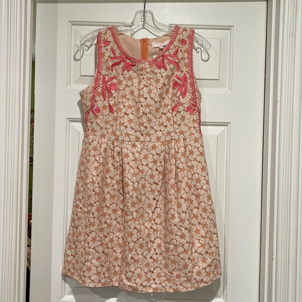 Sundress in coral and pink colors with pleated waist